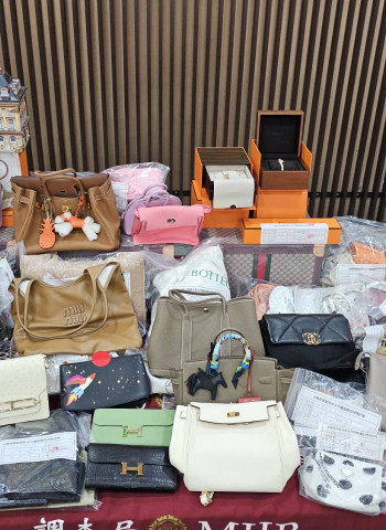 法務部調查局偵破投資詐騙案，查扣價值上億之各式高級名牌精品